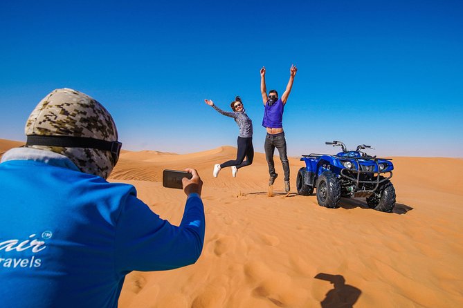 Dubai Red Dunes ATV, Camels, Stargazing & 5<em> BBQ Al Khayma Camp – Key points to know before booking’ /></p>
<ul>
<li><strong>Red dunes and a full hour on an ATV:</strong> Ride an open desert circuit with a helmet, instructor, and stops for photos and sandboarding.</li>
<li><strong>Al Khayma Camp is the evening centerpiece:</strong> Arabic coffee, dates, camel rides, henna, falcon photos, shisha, dinner, shows, and stargazing fill about three hours.</li>
<li><strong>Guides make a real difference:</strong> Dennis, Asif Foji, Abdul Wahab, Imran Khan, Omar, and others have been praised for clear help and friendly service, though your assigned guide will vary.</li>
<li><strong>The evening slot offers the most:</strong> Fire shows and stargazing are included with evening departures, while the 11:30 AM option has lunch but not those nighttime features.</li>
<li><strong>The price covers a lot:</strong> At about $88 per person, transport, fuel, helmets, ATV time, camp activities, soft drinks, and a buffet are included.</li>
<li><strong>Treat the ATV ride as a serious activity:</strong> You must be over 14, know how to drive, sign an indemnity form, and accept responsibility for damage, injury, or lost items.</li>
</ul>
<h2>Red dunes at Lahbab are the main event</h2>
<p> BBQ Al Khayma Camp – Red dunes at Lahbab are the main event’ /></p>
<p><p>Lahbab is known for its red-orange sand, and that color gives this trip more character than a basic desert drive close to Dubai. The dunes are the setting for the most active part of the day, with broad sandy slopes, photo stops, and room to feel the ATV climb and drop over the sand.</p>
</p>
<p><p>After pickup, you ride in an air-conditioned vehicle toward the desert. Pickup is offered from Dubai, Sharjah, and Ajman addresses, with extra fees possible for some locations. You are asked to be ready around 45 minutes before your selected departure time, and the pickup hour can shift during periods of intense summer heat.</p>
</p>
<p><p>On arrival, you can sit in an air-conditioned tent with Arabic tea, coffee, and dates before the ATV session. This pause is useful. It gives you time to drink water, listen to the instructions, and adjust to the heat before putting on your helmet.</p>
</p>
<p><p>The tour is planned for a maximum of 15 people, though the ATV operation itself can feel more structured than a small private outing. An instructor leads the ride, and the group stops for photos and sandboarding. Guides have also taken photos for participants, which is helpful when you want a picture without handing your phone to another rider.</p>
</p>
<div class="twil" style="margin: 20px 0; padding: 15px 0;"><p>More Desert Stargazing Safaris in the world:</p><ul style="margin: 10px 0; padding-left: 0; list-style: none;"><li style="margin: 0 0 12px 0; padding: 0 0 12px 0; border-bottom: 1px solid #E6DFF0; line-height: 1.4;"><a href="https://stargazingnights.com/dubai-sunset-camel-trek-al-khayma-camp-stargazing-bbq/">Dubai: Sunset Camel Trek, Al Khayma Camp, Stargazing & BBQ</a><br><span style="font-size: 0.82em; color: #555;"><span style="color: #4C1D95;">★</span> 4.8 · 2,588 reviews</span></li><li style="margin: 0 0 12px 0; padding: 0 0 12px 0; border-bottom: 1px solid #E6DFF0; line-height: 1.4;"><a href="https://stargazingnights.com/dubai-overnight-safari-dinner-stargazing-al-khayma-camp/">Dubai: Overnight Safari, Dinner, Stargazing & Al Khayma Camp</a><br><span style="font-size: 0.82em; color: #555;"><span style="color: #4C1D95;">★</span> 4.8 · 2,562 reviews</span></li><li style="margin: 0; padding: 0; border-bottom: none; line-height: 1.4;"><a href="https://stargazingnights.com/dubai-overnight-desert-safari-bbq-stargazing-at-al-khayma-camp/">Dubai Overnight Desert Safari, BBQ & Stargazing at Al Khayma Camp</a><br><span style="font-size: 0.82em; color: #555;"><span style="color: #4C1D95;">★</span> 5.0 · 2,327 reviews</span></li></ul></div><h2>What the 60-minute ATV ride is really like</h2>
<p><img width="669" height="446" decoding="async" src=