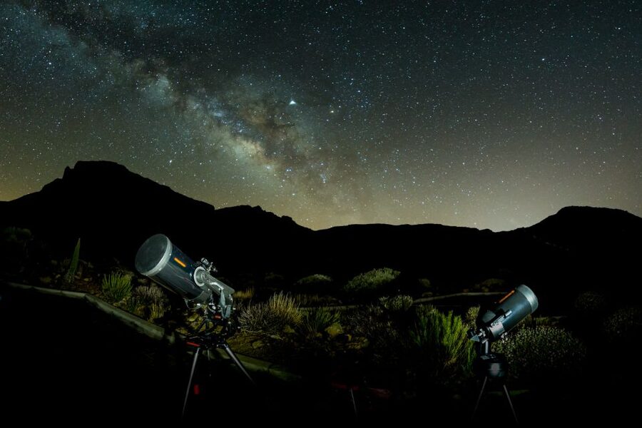 Telescopes set up under the Milky Way on the slopes of Teide